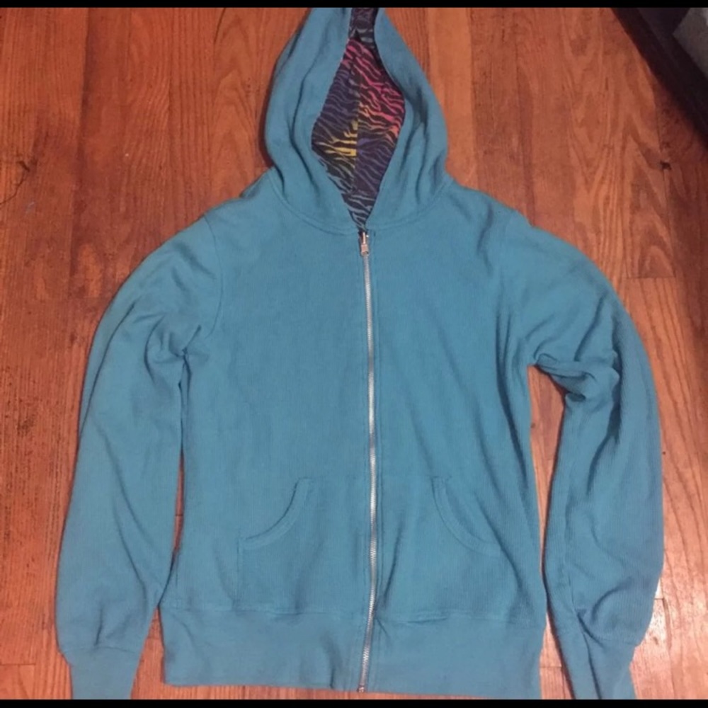 Reversible teal/zebra print sweatshirt